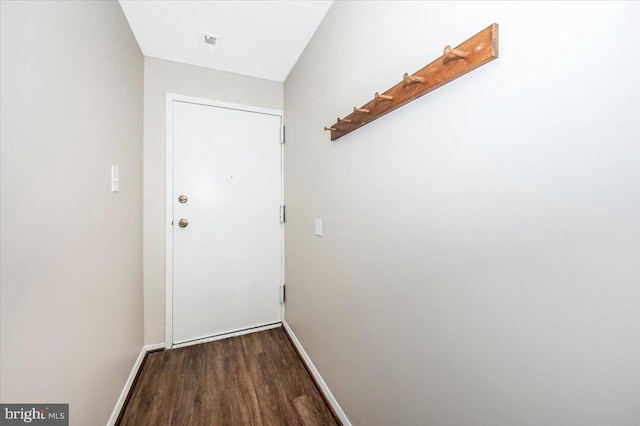 doorway to outside featuring dark hardwood / wood-style floors