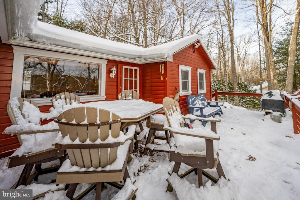 view of snow covered patio