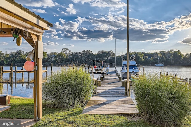 dock area featuring a water view