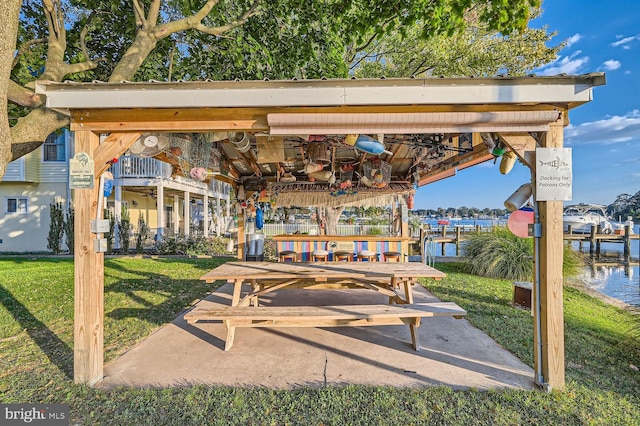 view of patio / terrace featuring a water view