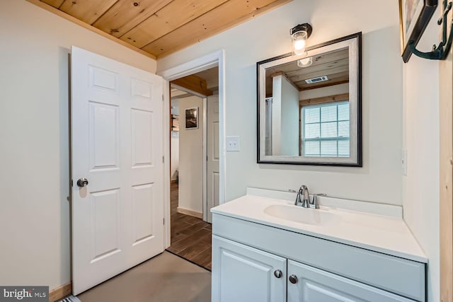 bathroom featuring vanity and wooden ceiling