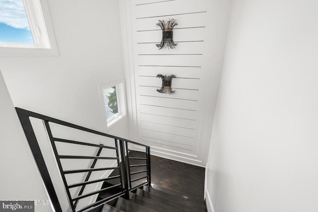 stairway featuring hardwood / wood-style floors