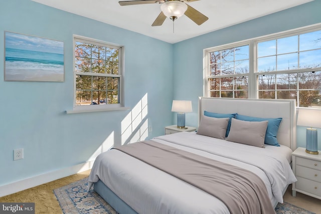 bedroom with carpet and ceiling fan