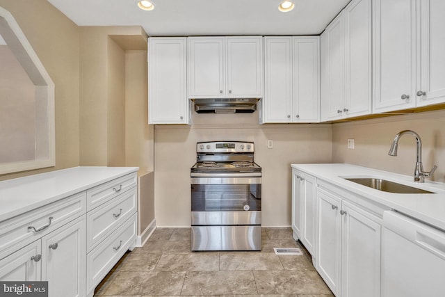 kitchen with white cabinetry, sink, stainless steel electric stove, and dishwasher