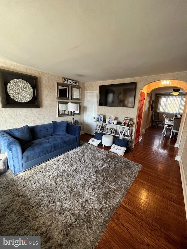 unfurnished living room with dark hardwood / wood-style flooring
