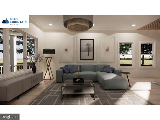 living room with plenty of natural light and dark wood-type flooring