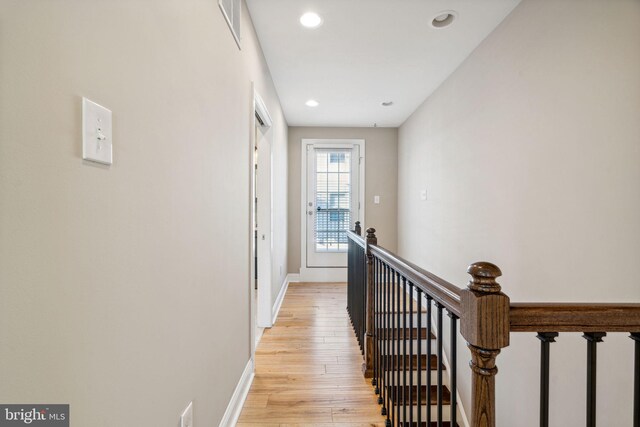 hall featuring light hardwood / wood-style floors