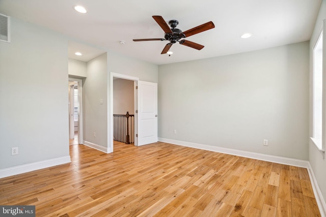 unfurnished bedroom with light hardwood / wood-style floors and ceiling fan