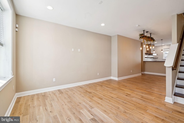 empty room with light wood-type flooring