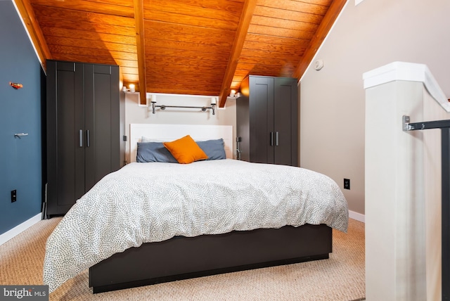 carpeted bedroom with wood ceiling and lofted ceiling with beams