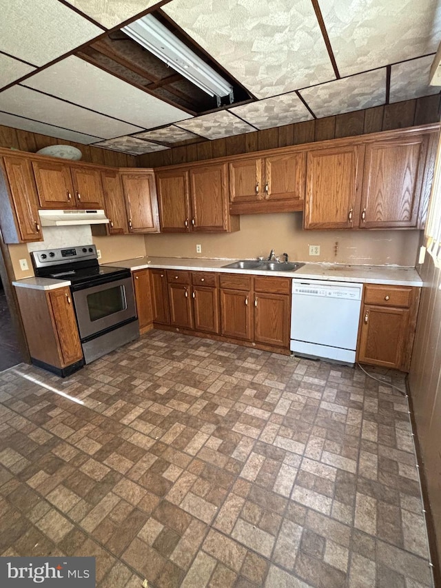 kitchen featuring sink, dishwasher, and stainless steel electric range oven