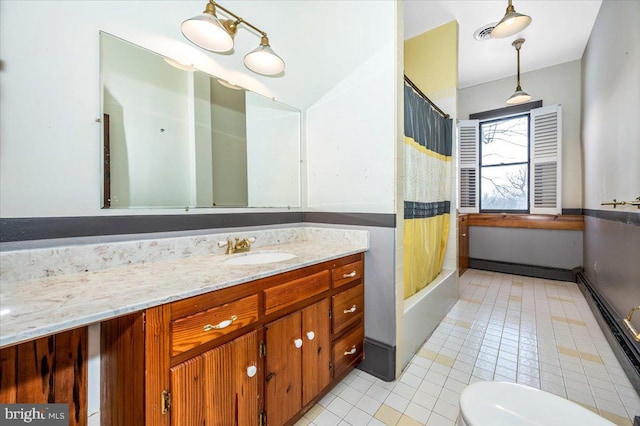 full bathroom with vanity, tile patterned floors, shower / bath combination with curtain, and toilet