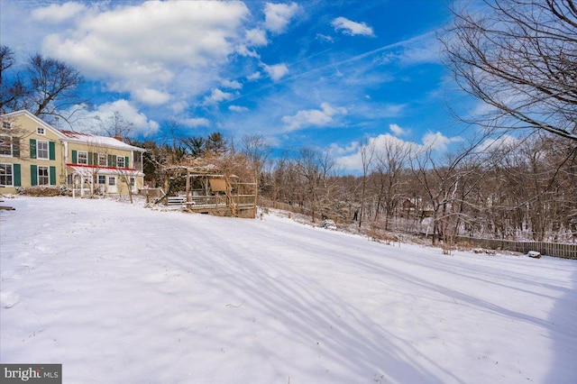 view of yard covered in snow