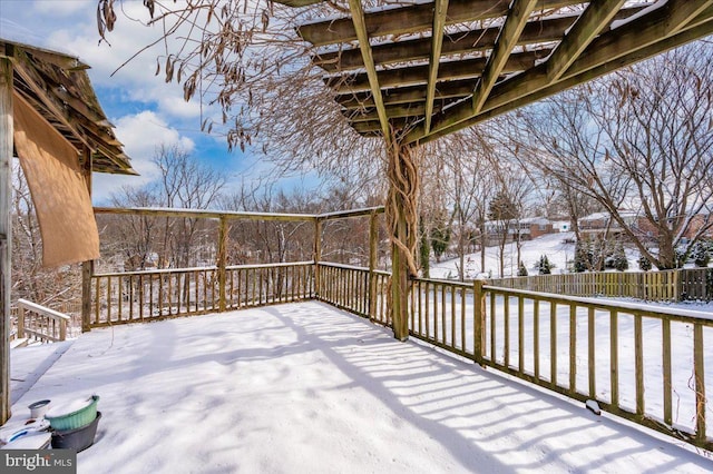 view of snow covered deck