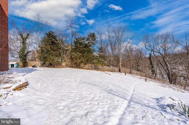 view of yard covered in snow