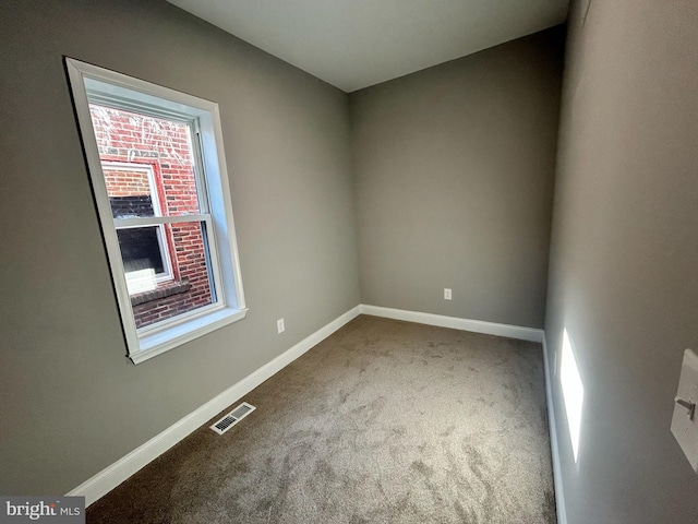 unfurnished room with carpet