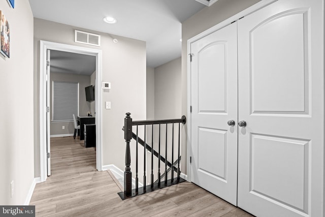 corridor featuring light wood-type flooring