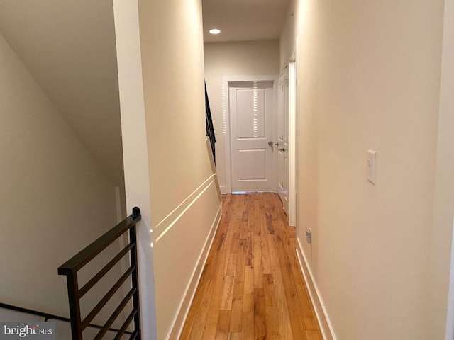 hall with light wood-type flooring