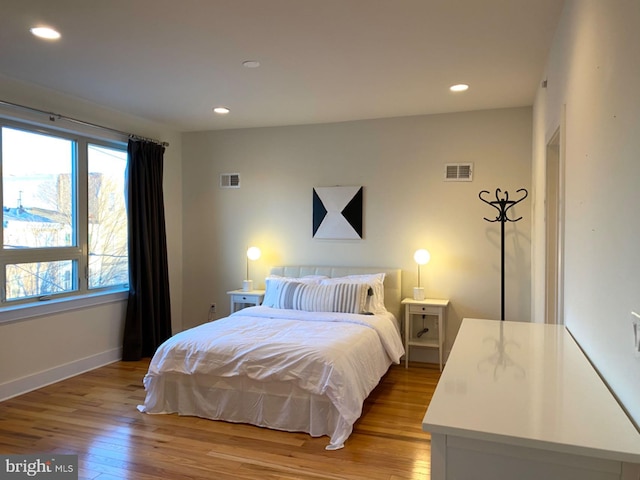 bedroom featuring light hardwood / wood-style floors