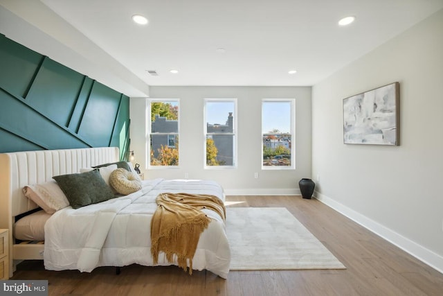 bedroom featuring hardwood / wood-style floors