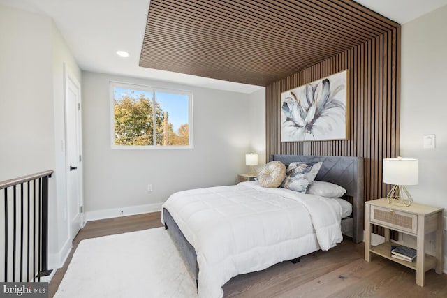 bedroom with wood-type flooring