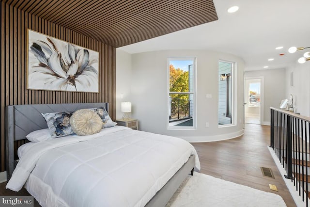 bedroom featuring hardwood / wood-style floors