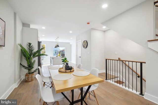 dining room featuring light hardwood / wood-style flooring