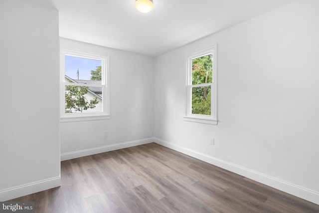 empty room featuring hardwood / wood-style flooring