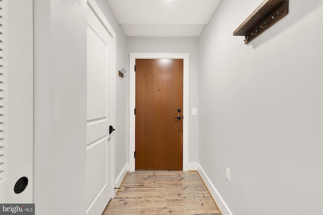 doorway to outside featuring light hardwood / wood-style floors