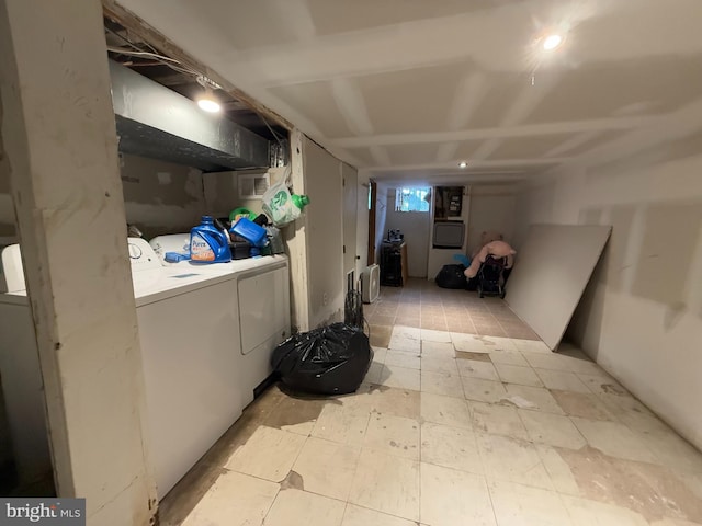 basement featuring washing machine and clothes dryer