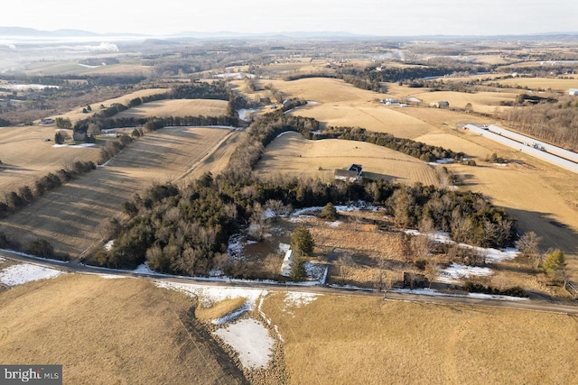 birds eye view of property featuring a rural view