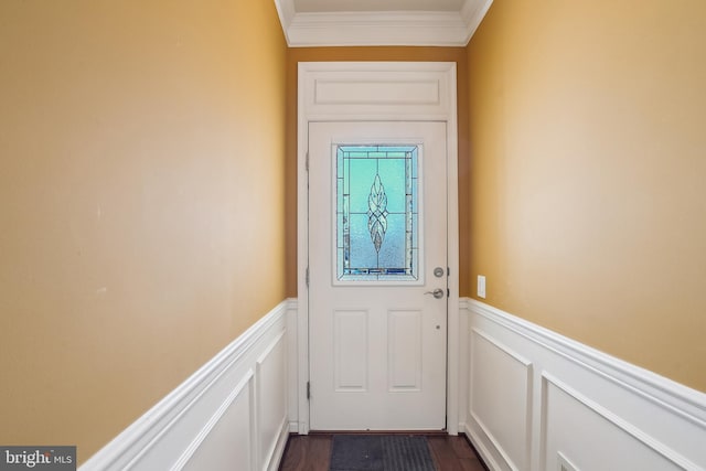 doorway with dark wood-type flooring and ornamental molding