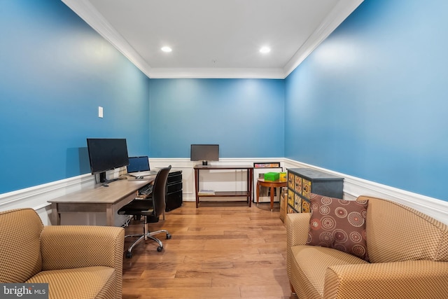 office featuring crown molding and light hardwood / wood-style floors