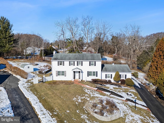 view of front of home with a lawn