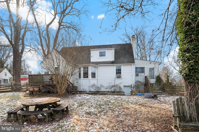 view of snow covered house