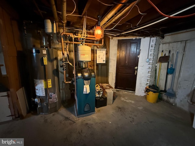 utility room with gas water heater