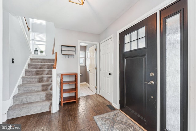 entrance foyer featuring dark wood-type flooring