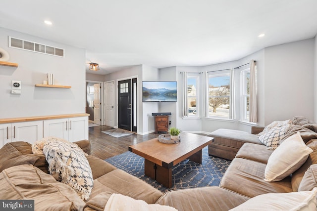 living room with dark wood-type flooring