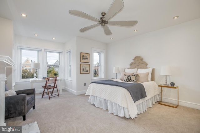 carpeted bedroom featuring ceiling fan