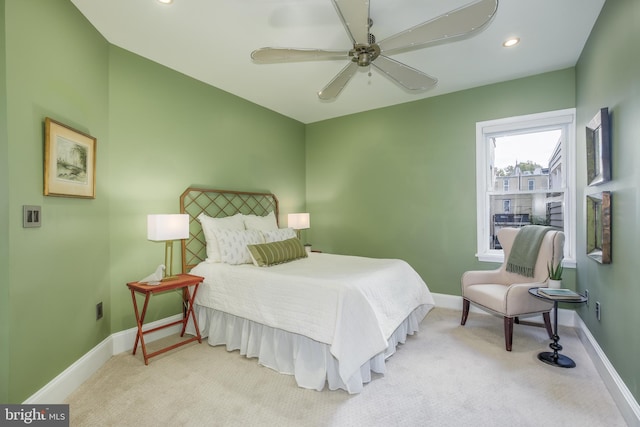 carpeted bedroom with ceiling fan