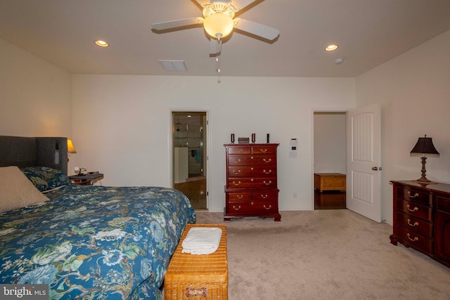 bedroom featuring light carpet and ceiling fan