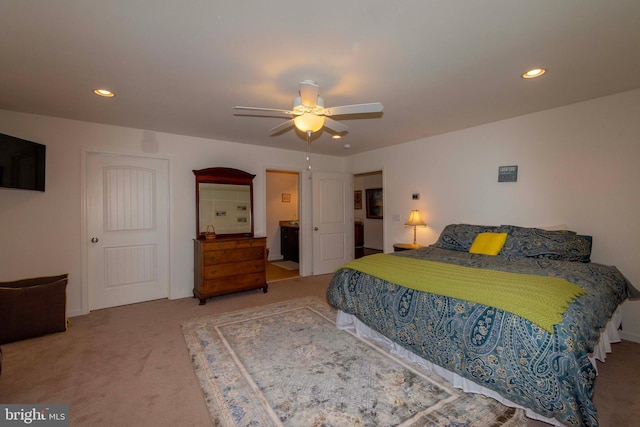 carpeted bedroom featuring ceiling fan