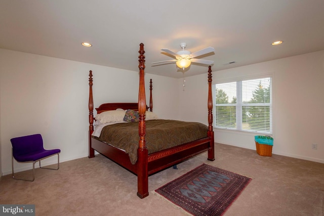 carpeted bedroom with ceiling fan