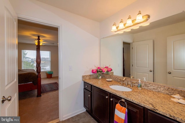 bathroom featuring vanity and ceiling fan