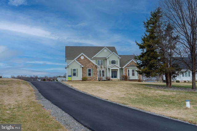 view of front facade with a front yard