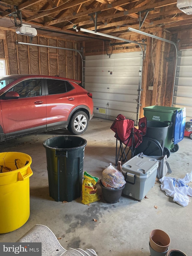 garage featuring a garage door opener