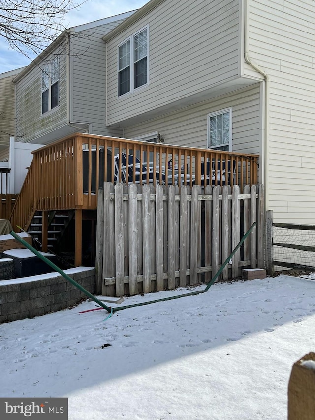 view of snow covered deck