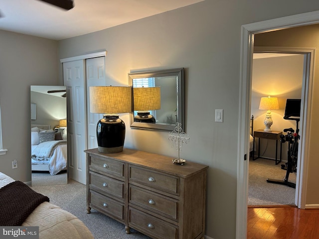 carpeted bedroom featuring a closet