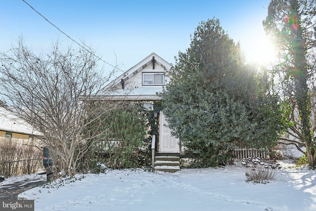 view of property hidden behind natural elements