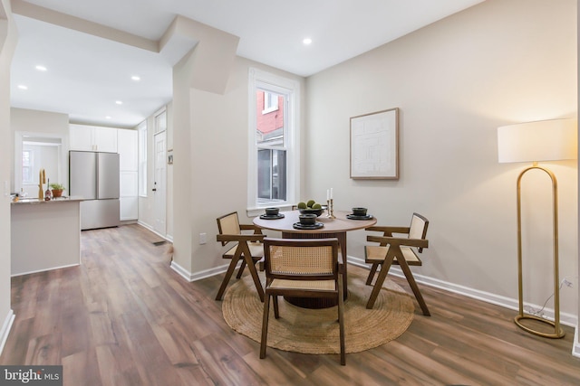 dining room featuring dark wood-type flooring